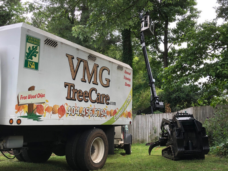 VMG Tree Care truck and tree removal equipment